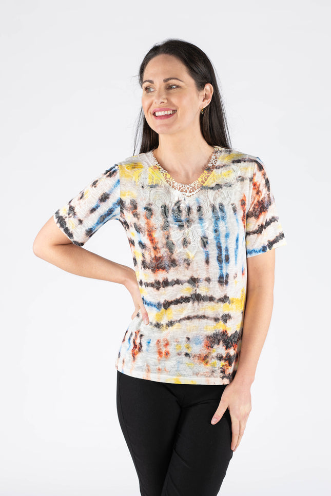Top abstract print with lace panel.