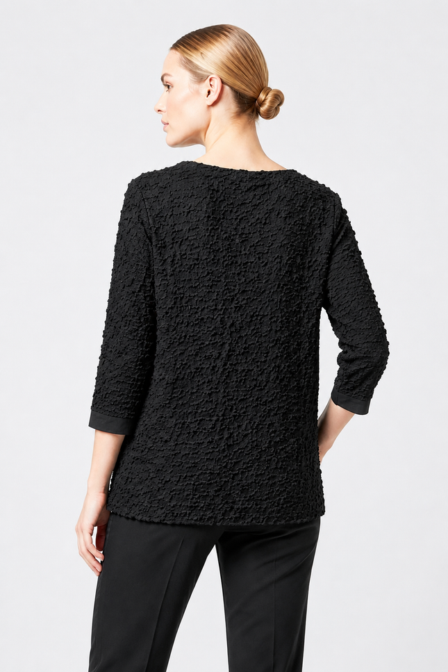 Top surface interest wrap effect with pocket and round neck