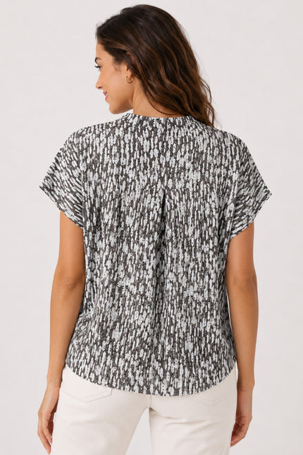 Top small speckle print with mid sleeve.