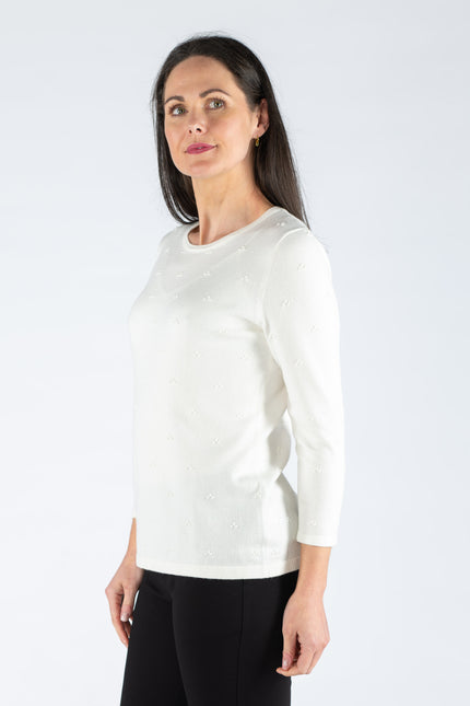 WHITE TEXTURED SPOT JUMPER WITH 3/4 SLEEVE